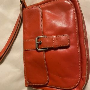 Ladies Orange wrist bag .